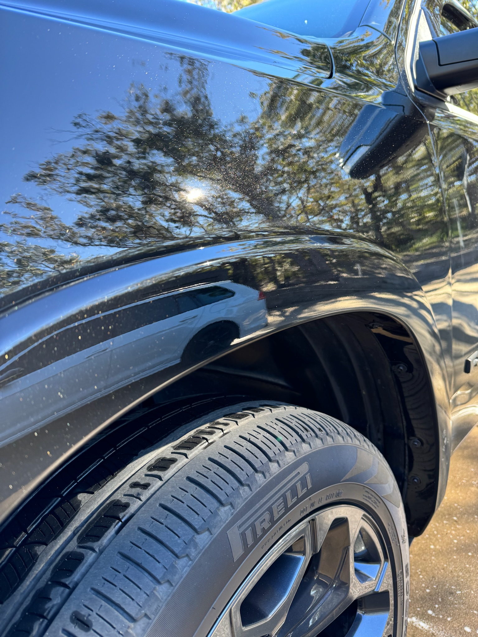After: mirror finish restored on black panel
